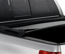 Load image into Gallery viewer, Lund 16-17 Nissan Titan XD (6.5ft. Bed w/o Titan Box) Genesis Elite Tri-Fold Tonneau Cover - Black