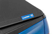 Load image into Gallery viewer, Lund 16-17 Nissan Titan XD (6.5ft. Bed w/o Titan Box) Genesis Elite Tri-Fold Tonneau Cover - Black