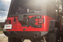 Load image into Gallery viewer, Rugged Ridge Spartacus HD Tire Carrier Whl Mount 87-06 YJ/TJ