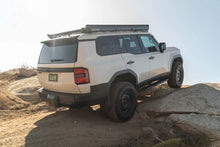 Load image into Gallery viewer, DV8 Offroad 24-25 Toyota Land Cruiser OE Plus Side Steps - Black Steel