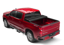Load image into Gallery viewer, Lund 05-15 Toyota Tacoma Fleetside (5ft. Bed) Hard Fold Tonneau Cover - Black
