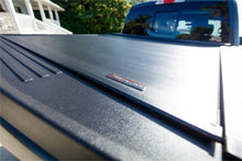 Load image into Gallery viewer, Roll-N-Lock 2019 Chevy Silverado 1500 77-3/4in E-Series Retractable Tonneau Cover