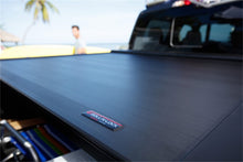 Load image into Gallery viewer, Roll-N-Lock 2019 Ram 1500 XSB 65.5in E-Series Retractable Tonneau Cover