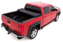 Load image into Gallery viewer, Lund 05-17 Nissan Frontier (6ft. Bed) Genesis Elite Tri-Fold Tonneau Cover - Black