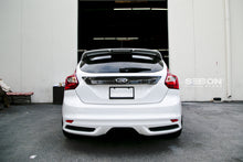 Load image into Gallery viewer, Seibon 12-13 Ford Focus 4 Door Carbon Fiber Tail Garnish