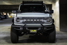 Load image into Gallery viewer, DV8 Offroad 21-22 Ford Bronco Factory Front Bumper Licence Relocation Bracket - Front