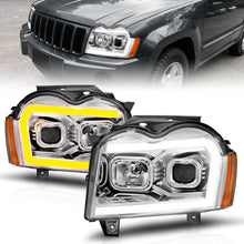 Load image into Gallery viewer, ANZO 05-07 Jeep Grand Cherokee Projector Headlights - w/ Light Bar Switchback Chrome Housing