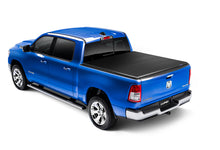 Load image into Gallery viewer, Lund 19-23 RAM 1500 (5.5ft Bed w/o RamBox Cargo Mgmt) Genesis Elite Tri-Fold Tonneau Cover - Black
