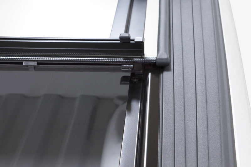 Access LOMAX Pro Series Tri-Fold Cover 07-19 Toyota Tundra 5ft6in Bed (Deck Rail) - Blk Diamond Mist AJ-USA, Inc