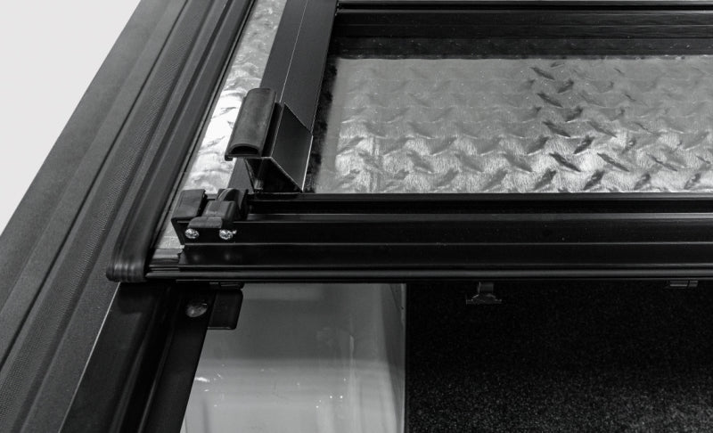 Access LOMAX Pro Series Tri-Fold Cover 07-19 Toyota Tundra 5ft6in Bed (Deck Rail) - Blk Diamond Mist AJ-USA, Inc