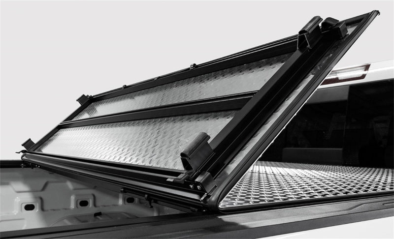Access LOMAX Tri-Fold Cover 05-20 Nissan Frontier w/ 5ft Bed - Black Urethane AJ-USA, Inc