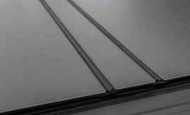 Access LOMAX Tri-Fold Cover 2022 Toyota Tundra 5Ft./6in. Bed w/ deck rail - Matte Black AJ-USA, Inc