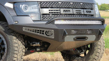 Load image into Gallery viewer, Addictive Desert Designs 10-14 Ford F-150 Raptor HoneyBadger Front Bumper w/ Winch Mount AJ-USA, Inc