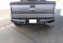 Load image into Gallery viewer, Addictive Desert Designs 10-14 Ford F-150 Raptor HoneyBadger Rear Bumper w/ Tow Hooks AJ-USA, Inc