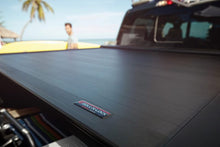 Load image into Gallery viewer, Roll-N-Lock 10-17 Dodge Ram 1500 - 3500 76in E-Series Retractable Tonneau Cover