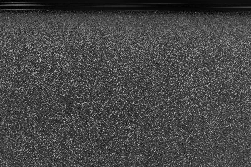 Lund 05-15 Toyota Tacoma Fleetside (5ft. Bed) Hard Fold Tonneau Cover - Black