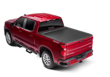 Load image into Gallery viewer, Roll-N-Lock 2019 Chevy Silverado 1500 68-3/8in E-Series Retractable Tonneau Cover