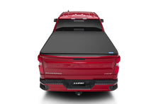 Load image into Gallery viewer, Lund 07-13 Chevy Silverado 1500 (8ft. Bed) Genesis Elite Tri-Fold Tonneau Cover - Black